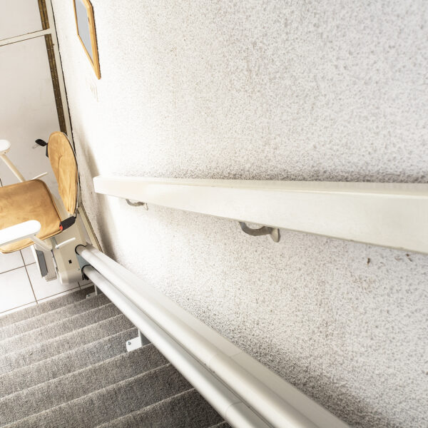 Stairlifts Leeds - Automatic stair lift on staircase